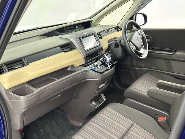 ホンダ フリード ハイブリット G ホンダセンシング 埼玉県 2016(平28)年 4.6万km コバルトブルーパール 純正ナビ　/ビルトインETC/両側電動スライドドア　/ＥＣＯＮ　/レーダークルーズコントロール　/レーンキープアシスト　/横滑り防止措置　/盗難防止措置　/純正フロアマット　/木目調パネル　/プッシュスタート　/ドアバイザー/ウインカーミラー/LEDヘッドライト