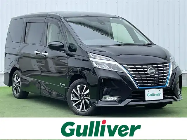 日産 セレナ e－パワー ハイウェイスター V 香川県 2021(令3)年 5.1万km ダイヤモンドブラック プロパイロット/　エマージェンシーブレーキ/　前方予測警報/　アダプティブLEDヘッドライト/　車線逸脱防止支援システム/　車線逸脱警報/　後側方衝突防止支援システム/　後側方車両検知警報/　標識検知機能/　後退時車両検知警報/　インテリジェントアラウンドビューモニター/社外9インチメモリーナビ /Bluetooth/フルセグTV/CD/DVD/HDMI/AUX/純正デジタルインナーミラー/フリップダウンモニター/ビルトインETC/両側パワースライドドア/シートヒーター(D/N席)/ステアリングヒーター/社外ドライブレコーダー/電動パーキングブレーキ(HOLDスイッチ付)/ドアバイザー/スマートキー/プッシュスタート/フロアマット
