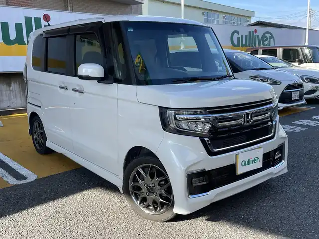 ホンダ Ｎ ＢＯＸ カスタム L ターボ 静岡県 2021(令3)年 6.4万km プラチナホワイトパール ワンオーナー/純正8インチナビ/フルセグTV/DVD/CD/BT/SD/MSV/USB/バックカメラ/両側パワースライドドア/ハーフレザーシート/前席シートヒーター /モデューロ15インチAW/衝突軽減ブレーキ/レーンキープアシスト/レーダークルーズコントロール/バックソナー/ETC/パドルシフト/ステアリングスイッチ/LEDヘッドライト/LEDフォグライト/スマートキー×2/保証書/取扱説明書/ナビ取扱説明書