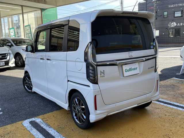 ホンダ Ｎ ＢＯＸ カスタム L ターボ 静岡県 2021(令3)年 6.4万km プラチナホワイトパール ワンオーナー/純正8インチナビ/フルセグTV/DVD/CD/BT/SD/MSV/USB/バックカメラ/両側パワースライドドア/ハーフレザーシート/前席シートヒーター /モデューロ15インチAW/衝突軽減ブレーキ/レーンキープアシスト/レーダークルーズコントロール/バックソナー/ETC/パドルシフト/ステアリングスイッチ/LEDヘッドライト/LEDフォグライト/スマートキー×2/保証書/取扱説明書/ナビ取扱説明書