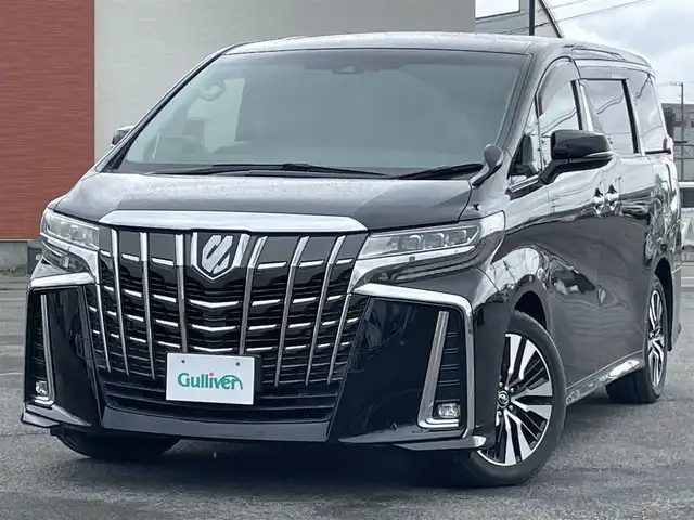 トヨタ アルファード S Cパッケージ 道央・札幌 2019(平31)年 8万km ブラック ４WD/社外メモリーナビ/CD/DVD/BT/フルセグ/社外フリップダウンモニター/トヨタセーフティセンス/プリクラッシュセーフティ/横滑り防止装置/レーダークルーズコントロール/レーンキープアシスト/クリアランスソナー/ブラインドスポットモニター/パーキングサポートブレーキ/ロードサインアシスト/バックカメラ/ビルトインETC/アイドリングストップ/ECOMODE/デジタルインナーミラー/両側パワースライドドア/パワーバックドア/前席/２列目パワーシート/前席シートヒーター/前席エアシート/D席メモリーシート/N席/２列目オットマン/レザーシート/革巻きウッドコンビステアリング/ステアリングリモコン/AC100V/電動パーキング/ブレーキホールド/MTモード付AT/nanoe/プッシュスタート/スマートキー/LEDヘッドライト/オートライト/オートハイビーム/フォグランプ/電動格納ミラー/ウィンカーミラー/純正フロアマット/ドアバイザー/スペアキー