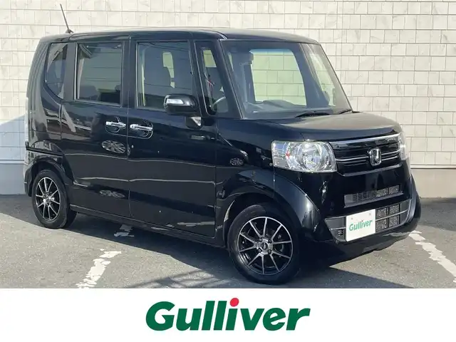 ホンダ Ｎ ＢＯＸ G SSパッケージ 愛知県 2017(平29)年 5.7万km クリスタルブラックパール ・純正8インチメモリーナビ/・フルセグテレビ/・CD/DVD再生機能/・Bluetooth接続機能/・ETC/・バックカメラ/・ベンチシート/・クラージオシートカバー/・両側電動スライドドア/・社外フロアマット/・社外14インチアルミホイール/・純正LEDヘッドライト/・オートライト/・スマートキー/・オートエアコン