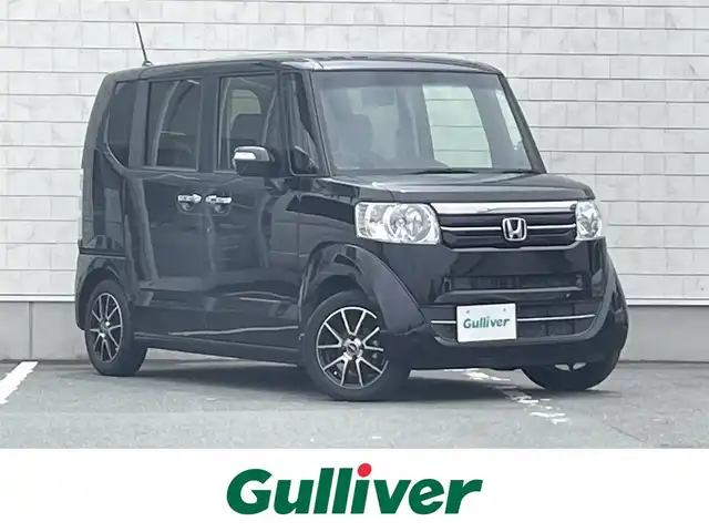 ホンダ Ｎ ＢＯＸ G SSパッケージ 愛知県 2016(平28)年 5.7万km クリスタルブラックパール ・純正8インチメモリーナビ/・フルセグテレビ/・CD/DVD再生機能/・Bluetooth接続機能/・ETC/・バックカメラ/・ベンチシート/・クラージオシートカバー/・両側電動スライドドア/・社外フロアマット/・社外14インチアルミホイール/・純正LEDヘッドライト/・オートライト/・スマートキー/・オートエアコン