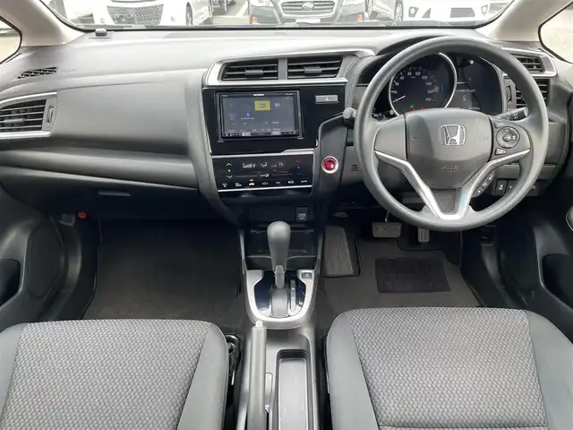 ホンダ フィット 13G F 鳥取県 2019(令1)年 4.1万km シャイニンググレーM ４・Ｗ・Ｄ/社外ナビ／フルセグ／ＤＶＤ／ＣＤ／ＢＴ/バックカメラ・ＥＴＣ/ホンダセンシング/レーダークルーズコントロール/レーンキープアシスト/アイドリングストップ/エコモードスイッチ/プッシュスタート/コンフォートビューＰＫＧ/電動格納ミラー/フロアマット
