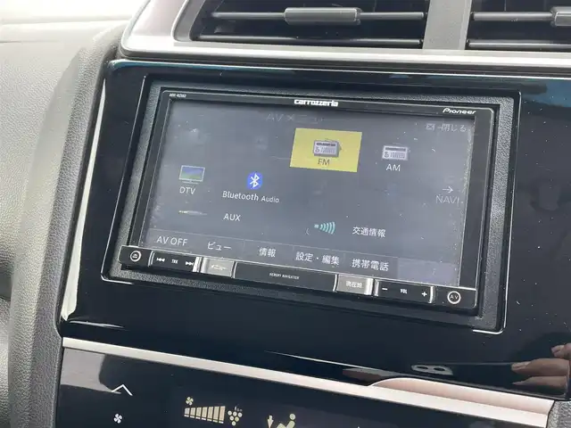 ホンダ フィット 13G F 鳥取県 2019(令1)年 4.1万km シャイニンググレーM ４・Ｗ・Ｄ/社外ナビ／フルセグ／ＤＶＤ／ＣＤ／ＢＴ/バックカメラ・ＥＴＣ/ホンダセンシング/レーダークルーズコントロール/レーンキープアシスト/アイドリングストップ/エコモードスイッチ/プッシュスタート/コンフォートビューＰＫＧ/電動格納ミラー/フロアマット