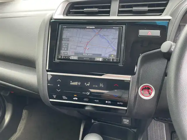 ホンダ フィット 13G F 鳥取県 2019(令1)年 4.1万km シャイニンググレーM ４・Ｗ・Ｄ/社外ナビ／フルセグ／ＤＶＤ／ＣＤ／ＢＴ/バックカメラ・ＥＴＣ/ホンダセンシング/レーダークルーズコントロール/レーンキープアシスト/アイドリングストップ/エコモードスイッチ/プッシュスタート/コンフォートビューＰＫＧ/電動格納ミラー/フロアマット