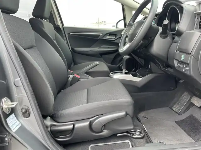 ホンダ フィット 13G F 鳥取県 2019(令1)年 4.1万km シャイニンググレーM ４・Ｗ・Ｄ/社外ナビ／フルセグ／ＤＶＤ／ＣＤ／ＢＴ/バックカメラ・ＥＴＣ/ホンダセンシング/レーダークルーズコントロール/レーンキープアシスト/アイドリングストップ/エコモードスイッチ/プッシュスタート/コンフォートビューＰＫＧ/電動格納ミラー/フロアマット