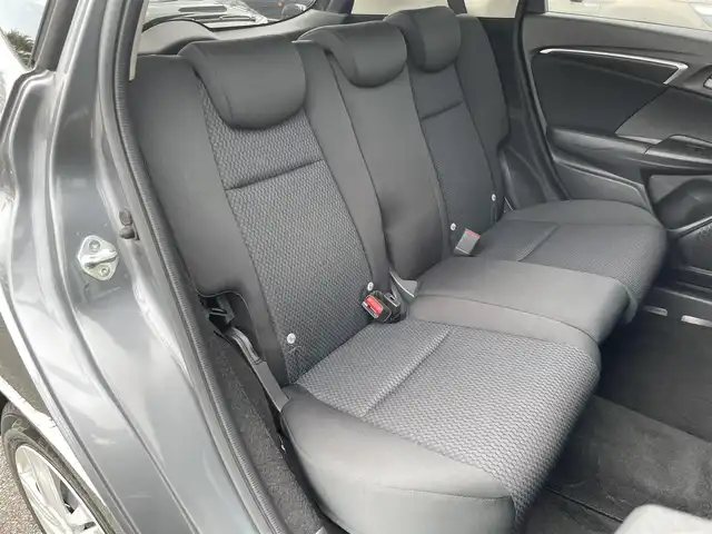 ホンダ フィット 13G F 鳥取県 2019(令1)年 4.1万km シャイニンググレーM ４・Ｗ・Ｄ/社外ナビ／フルセグ／ＤＶＤ／ＣＤ／ＢＴ/バックカメラ・ＥＴＣ/ホンダセンシング/レーダークルーズコントロール/レーンキープアシスト/アイドリングストップ/エコモードスイッチ/プッシュスタート/コンフォートビューＰＫＧ/電動格納ミラー/フロアマット