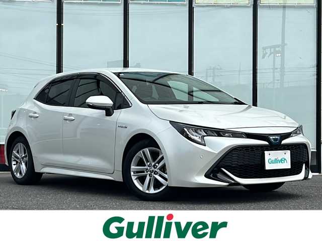 トヨタ カローラ スポーツ ハイブリッドG 山形県 2019(令1)年 6.1万km ホワイトパールクリスタルシャイン 禁煙車/ワンオーナー/トヨタセーフティセンス/横滑り防止装置/レーンキープアシスト/ブラインドスポットモニター/前後コーナーセンサー/レーダークルーズコントロール/バックカメラ/9インチ純正ナビ/（Bluetooth/フルセグ/AM/FM）/テレビキャンセラー/ステアリングスイッチ/ステアリングヒーター/DN席シートヒーター/ビルトインETC/スマートキー×２/取扱説明書/記録簿/純正アルミホイール/ドアバイザー