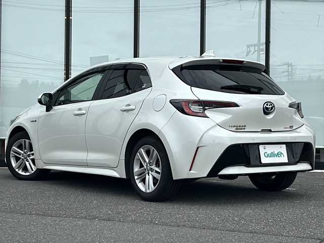 トヨタ カローラ スポーツ ハイブリッドG 山形県 2019(令1)年 6.1万km ホワイトパールクリスタルシャイン 禁煙車/ワンオーナー/トヨタセーフティセンス/横滑り防止装置/レーンキープアシスト/ブラインドスポットモニター/前後コーナーセンサー/レーダークルーズコントロール/バックカメラ/9インチ純正ナビ/（Bluetooth/フルセグ/AM/FM）/テレビキャンセラー/ステアリングスイッチ/ステアリングヒーター/DN席シートヒーター/ビルトインETC/スマートキー×２/取扱説明書/記録簿/純正アルミホイール/ドアバイザー