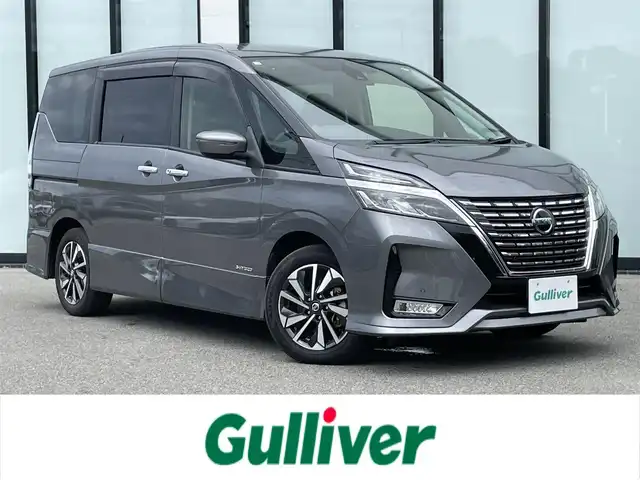 日産 セレナ ハイウェイスター V 大阪府 2021(令3)年 2.6万km ダークメタルグレー 純正7インチワイドナビ/　（フルセグTV/CD/DVD/Bluetooth/USB）/フリップダウンモニター/バックカメラ/両側パワースライドドア/前後ドライブレコーダー/プロパイロット/エマージェンシーブレーキ/クリアランスソナー/レーンキープアシスト/革巻ステアリング/LEDヘッドライト/純正16インチアルミホイール/純正フロアマット/ETC