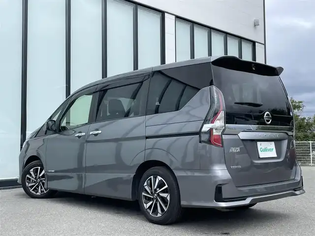 日産 セレナ ハイウェイスター V 大阪府 2021(令3)年 2.6万km ダークメタルグレー 純正7インチワイドナビ/　（フルセグTV/CD/DVD/Bluetooth/USB）/フリップダウンモニター/バックカメラ/両側パワースライドドア/前後ドライブレコーダー/プロパイロット/エマージェンシーブレーキ/クリアランスソナー/レーンキープアシスト/革巻ステアリング/LEDヘッドライト/純正16インチアルミホイール/純正フロアマット/ETC
