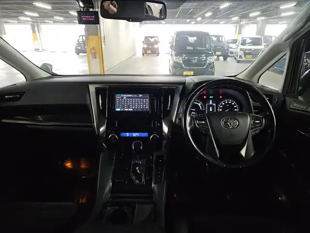 トヨタ ヴェルファイア ハイブリット ZR 福岡県 2016(平28)年 8.8万km ブラック 4WD/両側パワースライドドア/バックカメラ/ビルトインETC/ドライブレコーダー/レーダークルーズコントロール/クリアランスソナー/LEDヘッドランプ/オートライト/デュアルオートエアコン/木目調/革巻きコンビステアリング/ハーフレザーシート/前席パワーシート/運転席ポジションメモリー/2列目リラックスキャプテンシート/2列目マニュアルオットマン/純正17インチアルミホイール/スマートキー/プッシュエンジンスタート/禁煙車