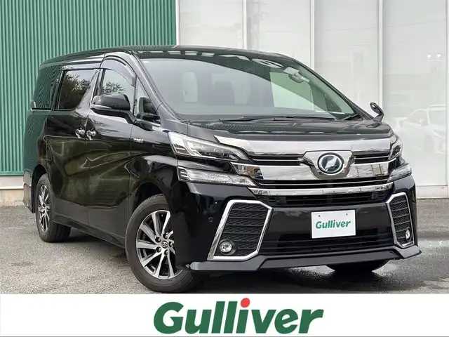 トヨタ ヴェルファイア ハイブリット ZR 福岡県 2016(平28)年 8.8万km ブラック 4WD/両側パワースライドドア/バックカメラ/ビルトインETC/ドライブレコーダー/レーダークルーズコントロール/クリアランスソナー/LEDヘッドランプ/オートライト/デュアルオートエアコン/木目調/革巻きコンビステアリング/ハーフレザーシート/前席パワーシート/運転席ポジションメモリー/2列目リラックスキャプテンシート/2列目マニュアルオットマン/純正17インチアルミホイール/スマートキー/プッシュエンジンスタート/禁煙車