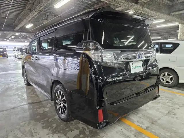 トヨタ ヴェルファイア ハイブリット ZR 福岡県 2016(平28)年 8.8万km ブラック 4WD/両側パワースライドドア/バックカメラ/ビルトインETC/ドライブレコーダー/レーダークルーズコントロール/クリアランスソナー/LEDヘッドランプ/オートライト/デュアルオートエアコン/木目調/革巻きコンビステアリング/ハーフレザーシート/前席パワーシート/運転席ポジションメモリー/2列目リラックスキャプテンシート/2列目マニュアルオットマン/純正17インチアルミホイール/スマートキー/プッシュエンジンスタート/禁煙車