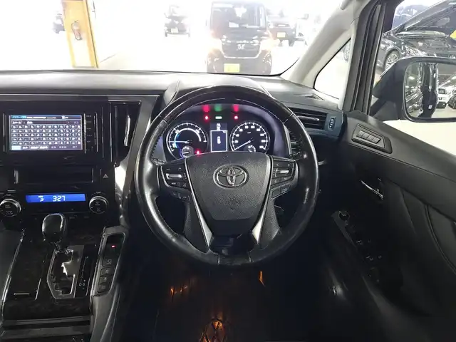 トヨタ ヴェルファイア ハイブリット ZR 福岡県 2016(平28)年 8.8万km ブラック 4WD/両側パワースライドドア/バックカメラ/ビルトインETC/ドライブレコーダー/レーダークルーズコントロール/クリアランスソナー/LEDヘッドランプ/オートライト/デュアルオートエアコン/木目調/革巻きコンビステアリング/ハーフレザーシート/前席パワーシート/運転席ポジションメモリー/2列目リラックスキャプテンシート/2列目マニュアルオットマン/純正17インチアルミホイール/スマートキー/プッシュエンジンスタート/禁煙車