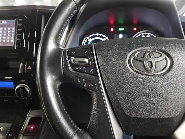 トヨタ ヴェルファイア ハイブリット ZR 福岡県 2016(平28)年 8.8万km ブラック 4WD/両側パワースライドドア/バックカメラ/ビルトインETC/ドライブレコーダー/レーダークルーズコントロール/クリアランスソナー/LEDヘッドランプ/オートライト/デュアルオートエアコン/木目調/革巻きコンビステアリング/ハーフレザーシート/前席パワーシート/運転席ポジションメモリー/2列目リラックスキャプテンシート/2列目マニュアルオットマン/純正17インチアルミホイール/スマートキー/プッシュエンジンスタート/禁煙車