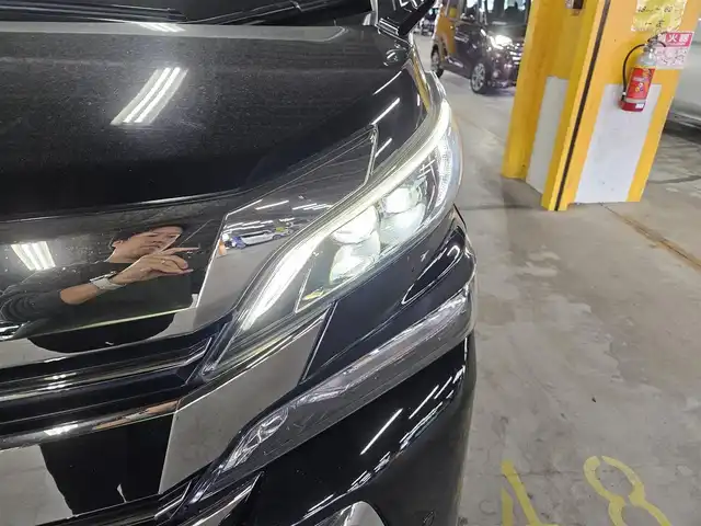 トヨタ ヴェルファイア ハイブリット ZR 福岡県 2016(平28)年 8.8万km ブラック 4WD/両側パワースライドドア/バックカメラ/ビルトインETC/ドライブレコーダー/レーダークルーズコントロール/クリアランスソナー/LEDヘッドランプ/オートライト/デュアルオートエアコン/木目調/革巻きコンビステアリング/ハーフレザーシート/前席パワーシート/運転席ポジションメモリー/2列目リラックスキャプテンシート/2列目マニュアルオットマン/純正17インチアルミホイール/スマートキー/プッシュエンジンスタート/禁煙車