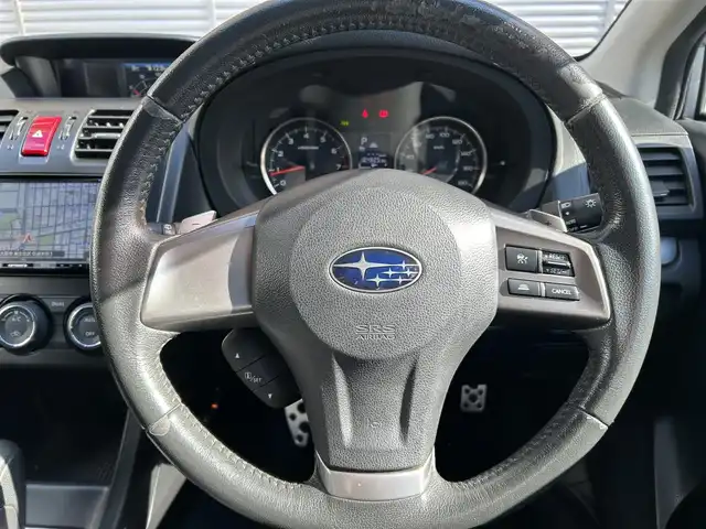 スバル インプレッサ ＸＶ 2．0i－L アイサイト 大阪府 2014(平26)年 10.5万km アイスシルバーメタリック ４WD/バックカメラ/アドリングストップ/Pioneer　7インチ型メモリナビ　/  AM/FM/CD/DVD/USB接続/ワンセグTV/MTモード付AT/パドルシフト/車間維持装置付きクルーズコントロール/D・N席パワーシート/アイサイトII/・レーダークルーズコントロール/・プリクラッシュブレーキ/・AT誤発進抑制/・車線逸脱警報/・先行車発進通知/ABS/横滑り防止機能/オートエアコン/オートライト/ウインカーミラー/純正アルミホイール/Wエアバック/トノカバー/取扱説明書