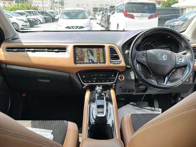 ホンダ ヴェゼル ハイブリッド Z ホンダセンシング 沖縄県 2020(令2)年 3.9万km ミッドナイトブルービームM 禁煙車　/純正ナビ/　(VXM-207VFEI、Buletooth)/シートヒーター/バックモニター　/ＥＴＣ　/ハーフレザーシート　/ドライブレコーダー　/スマートキー　/レーンアシスト　/レーダークルーズコントロール　/パドルシフト