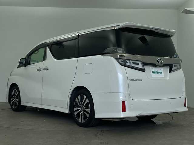 トヨタ ヴェルファイア Z Gエディション 鹿児島県 2019(令1)年 9.3万km ホワイトパールクリスタルシャイン メーカー10インチナビ/（AM/FM/CD/DVD/Bluetooth）/リアエンターテイメントシステム/JBLプレミアムサウンド/パノラミックビューモニター/ツインムーンルーフ/パーキングアシスト/3眼LEDヘッドランプ/デジタルインナーミラー/ブラインドスポットモニター/両側パワースライドドア/パワーバックドア/パワーシート/シートヒーター/ベンチレーション/ステアリングヒーター/トヨタセーフティセンス/・プリクラッシュセーフティ/・レーンディパーチャーアラート/・アダプティブハイビーム/・レーダークルーズコントロール/ETC2.0/前後ドライブレコーダー