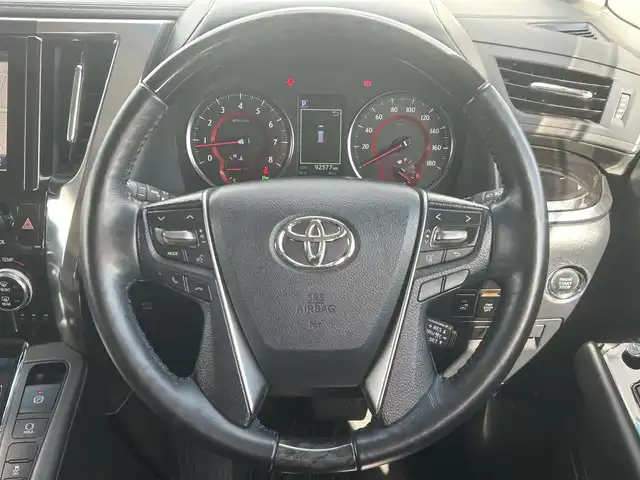 トヨタ ヴェルファイア Z Gエディション 岡山県 2019(令1)年 9.3万km ホワイトパールクリスタルシャイン 登録時走行距離92/577km/純正メーカーオプション10インチナビ/（AM/FM/DISC/TV/Bluetooth）/純正12.1型フリップダウンモニター/ツインムーンルーフ/JBLプレミアムサウンド/トヨタセーフティセンス/・プリクラッシュセーフティ/・レーンディパーチャーアラート/・アダプティブハイビーム/・レーダークルーズコントロール/パノラミックビューモニター/パーキングアシスト/3眼LEDヘッドランプ/デジタルインナーミラー/ブラインドスポットモニター/両側パワースライドドア/スペアキー×1/パワーバックドア/パワーシート(全席)/シートヒーター(全席)/シートベンチレーション(全席)/ステアリングヒーター/ビルトインETC2.0/前後ドライブレコーダー/電動パーキングブレーキ/オートブレーキホールド/プッシュスタート/スマートキー