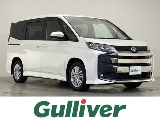トヨタ ノア ハイブリッド S－G 滋賀県 2024(令6)年 0.8万km ホワイトパールクリスタルシャイン 禁煙車/コネクティッドナビ対応10.5インチディスプレイオーディオ/【フルセグTV/Bluetooth/CD/DVD/HDMI】/バックモニター/前後ドライブレコーダー/ETC2.0/両側パワースライドドア/トヨタセーフティセンス/・プリクラッシュセーフティ/・レーンディパーチャーアラート/・オートマチックハイビーム/・ドライバー異常時対応システム/・発進遅れ告知機能/・レーントレーシングアシスト/・レーダークルーズコントロール/・ロードサインアシスト/・プロアクティブドライビングアシスト/クリアランスソナー/スマートキー/LEDライト