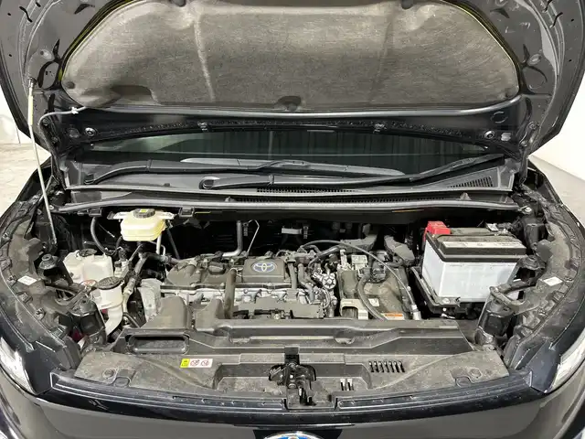 トヨタ ヴォクシー ハイブリッド S－Z 福岡県 2022(令4)年 3.7万km アティチュードブラックマイカ 純正ナビ/フルセグ/（CD/DVD/AM/FM/BT）/バックカメラ/両側パワースライド/レーダークルーズコントロール/コーナーセンサー/D/Nシートヒーター/ビルトインＥＴＣ/フリップダウンモニター/横滑り防止装置/オートホールド/衝突軽減システム/レーンアシスト/ＬＥＤヘッドライト/プッシュスタート/スマートキー/純正ＡＷ17インチ