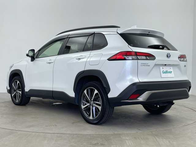 トヨタ カローラ クロス ハイブリッド Z 鹿児島県 2022(令4)年 3.5万km プラチナホワイトパールマイカ 純正9インチディスプレイオーディオ/パノラミックビューモニター/プリクラッシュセーフティ/レーンキープアシスト/レーダークルーズコントロール/電動リアゲート/ブラインドスポットモニター/ドライブレコーダー/ETC/AC100V/オートライト/ハーフレザーシート/シートヒーター/純正フロアマット/ドアバイザー/スマートキー/プッシュスタート