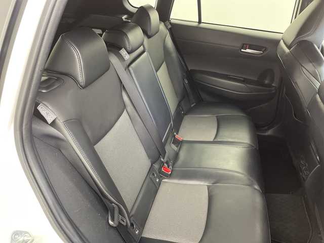 トヨタ カローラ クロス ハイブリッド Z 鹿児島県 2022(令4)年 3.5万km プラチナホワイトパールマイカ 純正9インチディスプレイオーディオ/パノラミックビューモニター/プリクラッシュセーフティ/レーンキープアシスト/レーダークルーズコントロール/電動リアゲート/ブラインドスポットモニター/ドライブレコーダー/ETC/AC100V/オートライト/ハーフレザーシート/シートヒーター/純正フロアマット/ドアバイザー/スマートキー/プッシュスタート