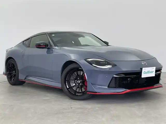 日産 フェアレディ Ｚ ニスモ 富山県 2024(令6)年 0.8万km グレーⅡ ワンオーナー/純正ナビ（AM/FM/USB/BT）/フルセグTV/バックカメラ/エマージェンシーブレーキ/インテリジェントクルーズコントロール/車線逸脱警報/ハイビームアシスト/LEDヘッドライト/クリアランスソナー/ハーフレザーシート/ドライブレコーダー/ビルトインETC/パドルシフト/レーダー探知機/スマートキー×２/プッシュスタート/純正フロアマット/取扱説明書/保証書