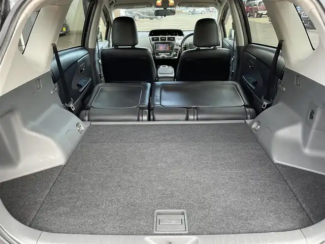 トヨタ プリウス α G チューンブラック 新潟県 2014(平26)年 8.9万km ブラック (株)IDOMが運営する【じしゃロン新潟店】の自社ローン専用車両になります。/こちらは現金またはオートローンご利用時の価格です。自社ローンご希望の方は別途その旨お申付け下さい/プッシュスタート/スペアキー１本付き/クルーズコントロール/純正SDナビ/ワンセグテレビ(走行時視聴可能)/CD、DVD、AM、FM視聴可能/Bluetooth接続可能/バックカメラ/ETC/ハーフレザーシート/本革巻きステアリング