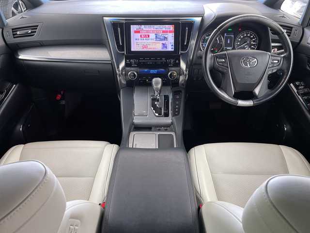 トヨタ アルファードハイブリット エグゼクティブ ラウンジ S 道央・札幌 2018(平30)年 5万km ホワイトパールクリスタルシャイン ・4WD/ワンオーナー/・ツインムーンルーフ/JBLサウンド/・トヨタセーフティセンス/・純正メーカーナビ /・JBLサウンドシステム/・BT/CD/USB/SD/AUX/フルセグTV/・全方位カメラ/・デジタルインナーミラー/・純正フリップダウンモニター/・両側パワースライドドア/・パワーバックドア/・MTモード付AT/・レザーシート/・1.2列目パワーシート/D席メモリシート付/・1.2列目シートヒーター/エアシート/・ステアリングヒーター/スイッチ/・LEDオートライト/・オートマチックハイビーム/・プッシュスタート/スマートキー/・ETC2.0/社外ドラレコ前方のみ/・AC100V・1500W