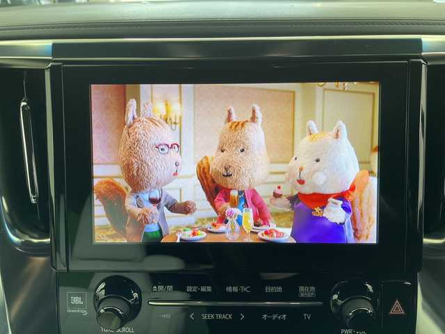 トヨタ アルファードハイブリット エグゼクティブ ラウンジ S 道央・札幌 2018(平30)年 5万km ホワイトパールクリスタルシャイン ・4WD/ワンオーナー/・ツインムーンルーフ/JBLサウンド/・トヨタセーフティセンス/・純正メーカーナビ /・JBLサウンドシステム/・BT/CD/USB/SD/AUX/フルセグTV/・全方位カメラ/・デジタルインナーミラー/・純正フリップダウンモニター/・両側パワースライドドア/・パワーバックドア/・MTモード付AT/・レザーシート/・1.2列目パワーシート/D席メモリシート付/・1.2列目シートヒーター/エアシート/・ステアリングヒーター/スイッチ/・LEDオートライト/・オートマチックハイビーム/・プッシュスタート/スマートキー/・ETC2.0/社外ドラレコ前方のみ/・AC100V・1500W