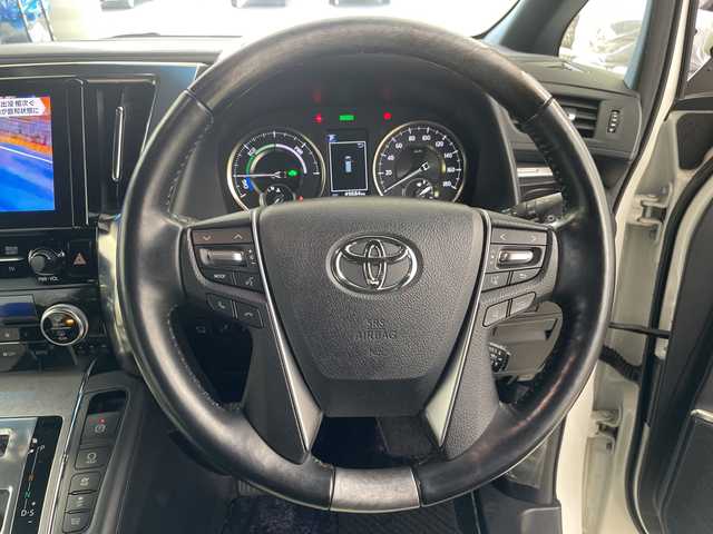 トヨタ アルファードハイブリット エグゼクティブ ラウンジ S 道央・札幌 2018(平30)年 5万km ホワイトパールクリスタルシャイン ・4WD/ワンオーナー/・ツインムーンルーフ/JBLサウンド/・トヨタセーフティセンス/・純正メーカーナビ /・JBLサウンドシステム/・BT/CD/USB/SD/AUX/フルセグTV/・全方位カメラ/・デジタルインナーミラー/・純正フリップダウンモニター/・両側パワースライドドア/・パワーバックドア/・MTモード付AT/・レザーシート/・1.2列目パワーシート/D席メモリシート付/・1.2列目シートヒーター/エアシート/・ステアリングヒーター/スイッチ/・LEDオートライト/・オートマチックハイビーム/・プッシュスタート/スマートキー/・ETC2.0/社外ドラレコ前方のみ/・AC100V・1500W