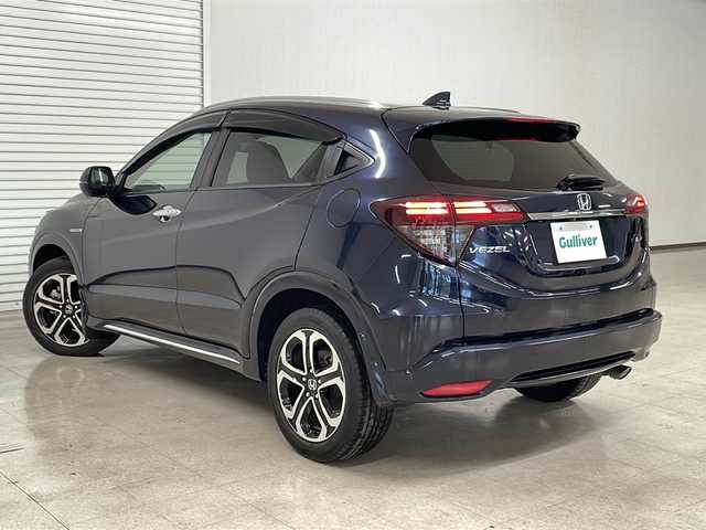 ホンダ ヴェゼル ハイブリッド Z ホンダセンシング 熊本県 2019(平31)年 6.9万km ミッドナイトブルービームM 純正８インチナビ/衝突軽減ブレーキ　/レーダークルーズコントロール　/ビルトイン/ＥＴＣ　/バックカメラ　/フルセグＴＶ　/ハーフレザー　/シートヒーター　/ドライブレコーダー　/コーナーセンサー　/ＬＥＤヘッドライト/保証書/取扱説明書