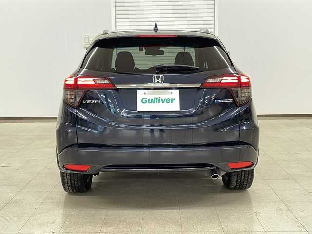 ホンダ ヴェゼル ハイブリッド Z ホンダセンシング 熊本県 2019(平31)年 6.9万km ミッドナイトブルービームM 純正８インチナビ/衝突軽減ブレーキ　/レーダークルーズコントロール　/ビルトイン/ＥＴＣ　/バックカメラ　/フルセグＴＶ　/ハーフレザー　/シートヒーター　/ドライブレコーダー　/コーナーセンサー　/ＬＥＤヘッドライト/保証書/取扱説明書