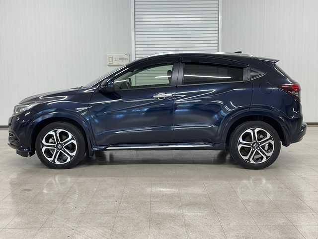 ホンダ ヴェゼル ハイブリッド Z ホンダセンシング 熊本県 2019(平31)年 6.9万km ミッドナイトブルービームM 純正８インチナビ/衝突軽減ブレーキ　/レーダークルーズコントロール　/ビルトイン/ＥＴＣ　/バックカメラ　/フルセグＴＶ　/ハーフレザー　/シートヒーター　/ドライブレコーダー　/コーナーセンサー　/ＬＥＤヘッドライト/保証書/取扱説明書
