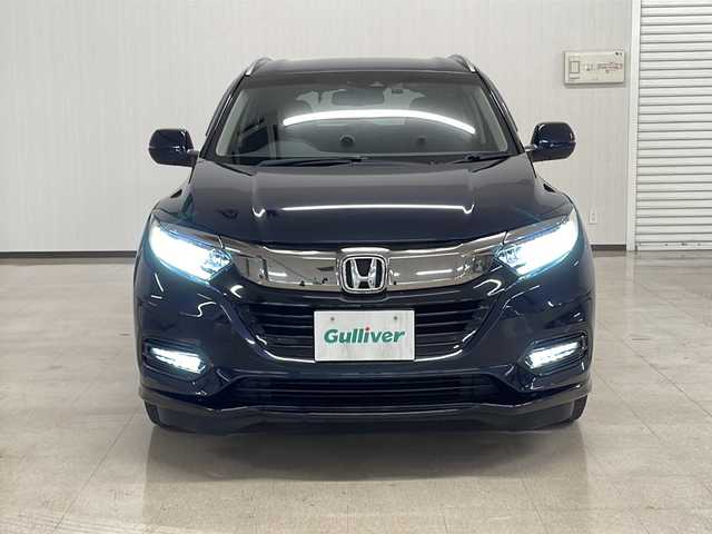 ホンダ ヴェゼル ハイブリッド Z ホンダセンシング 熊本県 2019(平31)年 6.9万km ミッドナイトブルービームM 純正８インチナビ/衝突軽減ブレーキ　/レーダークルーズコントロール　/ビルトイン/ＥＴＣ　/バックカメラ　/フルセグＴＶ　/ハーフレザー　/シートヒーター　/ドライブレコーダー　/コーナーセンサー　/ＬＥＤヘッドライト/保証書/取扱説明書