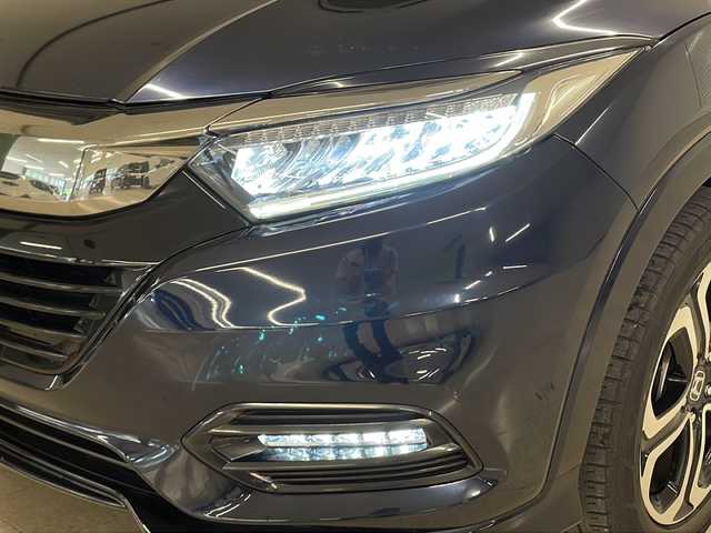 ホンダ ヴェゼル ハイブリッド Z ホンダセンシング 熊本県 2019(平31)年 6.9万km ミッドナイトブルービームM 純正８インチナビ/衝突軽減ブレーキ　/レーダークルーズコントロール　/ビルトイン/ＥＴＣ　/バックカメラ　/フルセグＴＶ　/ハーフレザー　/シートヒーター　/ドライブレコーダー　/コーナーセンサー　/ＬＥＤヘッドライト/保証書/取扱説明書