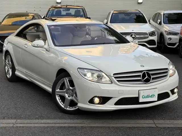 メルセデス・ベンツ ＣＬ５５０ デジーノ AMGエディション 東京都 2006(平18)年 1.6万km カルサイトホワイト 限定100台特別限定車/ワンオーナー/保証書・取説・ナビ取説・キーレスキー×２/H19.20.21.23.27.29.R1.3.4.5ディーラー記録簿有/ナイトビューアシスト/サンルーフ/車間距離警告/ABC（アクティブ・ボディ・コントロール）・車高調整機能・サスペンション自動制御/ウッドコンビハンドル・オートチルト・ステアリングスイッチ/クルーズコントロール/デジーノポーセレン（乳白色）アニリンレザーシート/前席メモリ付パワーシート・シートヒーター・ベンチレーション/マルチコントロールシートバック/COMANDシステム 純正HDDナビ/DVD/CD(ch)/MSV/ハーマン・カードンサウンドシステム/バックカメラ・パーキングアシスト/パークトロニック/ビルトインETC/純正19インチマルチピースアルミ/HID・前後フォグ・オートライト・AFS・ヘッドライトクリーナー/電格ウィンカーミラー/ドアイージークロージャー/電動パーキングブレーキ/サイド＆カーテンエアバック