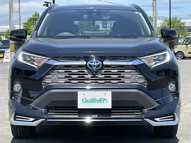 トヨタ ＲＡＶ４ ハイブリッドG 道央・札幌 2021(令3)年 3.1万km アティチュードブラックマイカ ４WD/モデリスタエアロ/純正ディーラーOPナビ/AM/FM/BT/フルセグ/トヨタセーフティセンス/プリクラッシュセーフティ/横滑り防止装置/レーダークルーズコントロール/レーンキープアシスト/クリアランスソナー/ブラインドスポットモニター/リアクロストラフィックアラート/パーキングサポートブレーキ/ロードサインアシスト/パノラミックビューモニター/ビルトインETC/ドライブレコーダー/自動防眩ミラー/EVMODE/DRIVEMODE切替/パワーバックドア/D席パワーシート/D席メモリーシート/前席シートヒーター/レザーシート/革巻きステアリング/ステアリングリモコン/ハンドルヒーター/AC100V/MTモード付AT/プッシュスタート/スマートキー/LEDヘッドライト/オートライト/オートハイビーム/フォグランプ/電動格納ミラー/ウィンカーミラー/純正フロアマット/ドアバイザー