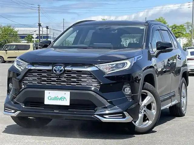トヨタ ＲＡＶ４ ハイブリッドG 道央・札幌 2021(令3)年 3.1万km アティチュードブラックマイカ ４WD/モデリスタエアロ/純正ディーラーOPナビ/AM/FM/BT/フルセグ/トヨタセーフティセンス/プリクラッシュセーフティ/横滑り防止装置/レーダークルーズコントロール/レーンキープアシスト/クリアランスソナー/ブラインドスポットモニター/リアクロストラフィックアラート/パーキングサポートブレーキ/ロードサインアシスト/パノラミックビューモニター/ビルトインETC/ドライブレコーダー/自動防眩ミラー/EVMODE/DRIVEMODE切替/パワーバックドア/D席パワーシート/D席メモリーシート/前席シートヒーター/レザーシート/革巻きステアリング/ステアリングリモコン/ハンドルヒーター/AC100V/MTモード付AT/プッシュスタート/スマートキー/LEDヘッドライト/オートライト/オートハイビーム/フォグランプ/電動格納ミラー/ウィンカーミラー/純正フロアマット/ドアバイザー