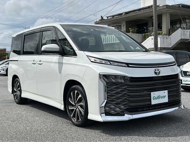 トヨタ ヴォクシー S－Z 沖縄県 2022(令4)年 1.8万km ホワイトパールクリスタルシャイン 前後ドラレコ　/両側パワスラ　/バックカメラ/ＥＴＣ　/純正ナビ　ＡＭ／ＦＭ／ＣＤ／ＢＴ　/シートヒーターＤ／Ｎ席　/コーナーセンサー　/フルセグＴＶ　/クルーズコントロール　/純正フロアマット　/ＬＥＤヘッドライト