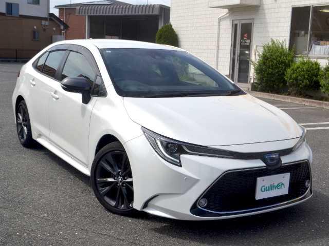 トヨタ カローラ ハイブリット ダブルバイビー 宮城県 2021(令3)年 0.5万km ホワイトパールクリスタルシャイン /　1オーナー/　9インチディスプレイオーディオ(MOP)/　　・ナビ/　　・フルセグTV/　　・Bluetooth/　　・Apple CarPlay/　　・Android Auto/　　・Miracast/　CD/DVDデッキ/　バックモニター/　ビルトインETC/　前後ドライブレコーダー/　シートヒーター/　ステアリングヒーター/　スマートキー2個/　TOYOTA Safety Sense/　ブラインドスポットモニター/　レーダークルーズコントロール/　LEDヘッドライト/　LEDフォグランプ/　AC100V/　純正17インチAW/　フロアマット/　ドアバイザー/