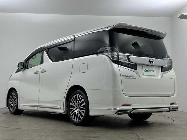トヨタ ヴェルファイア ZA Gエディション 鹿児島県 2015(平27)年 4.1万km ホワイトパールクリスタルシャイン 純正ナビ/（フルセグ/Bluetooth/CD/DVD）/トヨタセーフティセンス/プリクラッシュセーフティ　/ＪＢＬプレミアムサウンド　/モデリスタエアロ　/純正フリップダウンモニター　/レーダークルーズコントロール/パノラミックビューモニター/両側パワースライドドア/前席シートヒーター/運転席パワーシート　/助手席パワーシート/純正ビルトインＥＴＣ/レザーシート/オットマンシート/レーンキープアシスト/バックカメラ/3列シート/電動リアゲート/ウォークスルー/純正18インチアルミホイール/オートマチックハイビーム/前後コーナーセンサー/保証書/取扱説明書/スペアキー