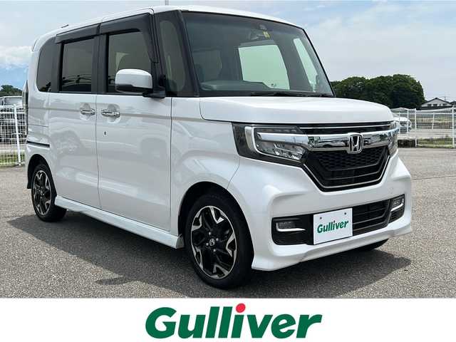 ホンダ Ｎ ＢＯＸ カスタム G L ターボ ホンダセンシング 富山県 2019(令1)年 1.8万km プラチナホワイトパール ４WD/純正ナビ/フルセグ/BT/CD/DVD/バックカメラ/ビルトインETC/衝突軽減ブレーキ/レーンキープアシスト/レーダークルーズコントロール/ドライブレコーダー/シートヒーター/純正１５インチAW/オートライト/オートハイビーム/純正フロアマット/両側パワースライドドア/スマートキー