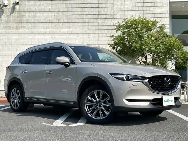 マツダ ＣＸ－８ XD Lパッケージ 愛媛県 2022(令4)年 5.4万km プラチナクォーツメタリック ワンオーナー/4WD/マツダコネクトナビ /・フルセグTV/Bluetooth/USB/全方位カメラ/・バック/フロントカメラ/BOSEサウンドシステム/黒革シート/・D/N席パワーシート/・D席メモリーシート/・前、2列目席 シートヒーター/ステアリングヒーター/前後ドライブレコーダー/パワーバックドア /衝突軽減ブレーキ/レーダークルーズコントロール/レーンキープアシスト/ブラインドスポットモニター/ヘッドアップディスプレイ/クリアランスソナー /オートブレーキホールド/・電動パーキング/2列目サンシェード/アイドリングストップ/電動格納ミラー/・ウィンカーミラー /プッシュスタート/・スペアキー/取扱説明書/保証書