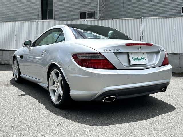 メルセデス・ベンツ ＳＬＫ２００ 栃木県 2013(平25)年 4.2万km イリジウムシルバー 純正メーカーナビ（フルセグTV/Bluetooth/CD/DVD）/AMGスポーツパッケージ/電動オープン/コーナーセンサー/ETC/純正フロアマット/純正18インチアルミホイール/ステアリングリモコン/革巻きステアリング/パドルシフト/オートライト/横滑り防止装置/シートヒーター/前席メモリーシート/ドライブレコーダー/スペアキー１