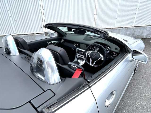 メルセデス・ベンツ ＳＬＫ２００ 栃木県 2013(平25)年 4.2万km イリジウムシルバー 純正メーカーナビ（フルセグTV/Bluetooth/CD/DVD）/AMGスポーツパッケージ/電動オープン/コーナーセンサー/ETC/純正フロアマット/純正18インチアルミホイール/ステアリングリモコン/革巻きステアリング/パドルシフト/オートライト/横滑り防止装置/シートヒーター/前席メモリーシート/ドライブレコーダー/スペアキー１